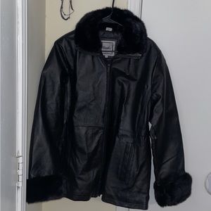 Leather insulated fur coat. Size large, brand new never been worn.